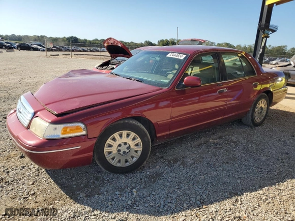 2003 Ford Crown Victoria Standard with VIN 2FAFP73W83X161187, listed as a Copart auction lot 72444624 with 128,045 mi miles and Salvage Title. Bid and sale history available at carsss.com. Image 1.
