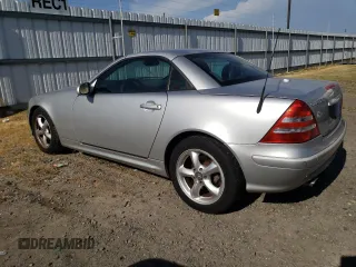 2001 Mercedes-Benz SLK-Class with VIN WDBKK65F11F178256, listed as a Copart auction lot 54979975 with 95,439 mi miles and Salvage Title. Bid and sale history available at carsss.com. Image 2.