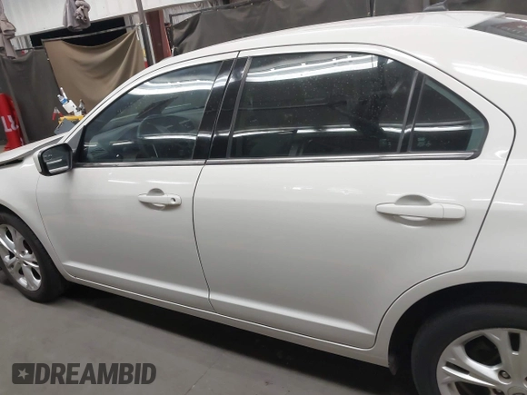 2012 Ford Fusion SE with VIN 3FAHP0HA4CR259743, listed as a IAAI auction lot 42058404 with 118,740 mi miles and . Bid and sale history available at DreamBid. Image 14.