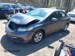 2014 Honda Civic LX with VIN 2HGFB2F50EH513868, listed as a IAAI auction lot 41986283 with 160,391 mi miles and . Bid and sale history available at DreamBid. Image 17.
