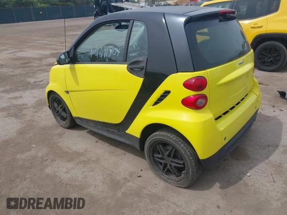 2013 Smart fortwo Pure with VIN WMEEJ3BA5DK663165, listed as a IAAI auction lot 42291804 with 105,074 mi miles and . Bid and sale history available at DreamBid. Image 3.