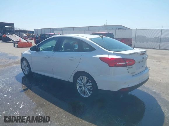 2016 Ford Focus Titanium с VIN 1FADP3J27GL359200, выставлен на аукционе IAAI как лот 42005989 с пробегом 135 589 миль миль и . История ставок и продаж доступна на DreamBid. Изображение 3.