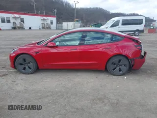 2021 Tesla Model 3 Long Range with VIN 5YJ3E1EB0MF902833, listed as a IAAI auction lot 41854474 with 41,982 mi miles and . Bid and sale history available at DreamBid. Image 14.