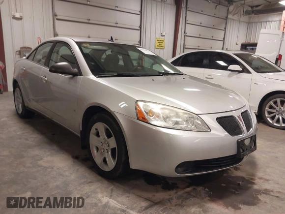 2009 Pontiac G6 w/1SA *Ltd Avail* with VIN 1G2ZG57B094155004, listed as a IAAI auction lot 41925584 with 123,169 mi miles. Bid and sale history available at carsss.com. Image 1.
