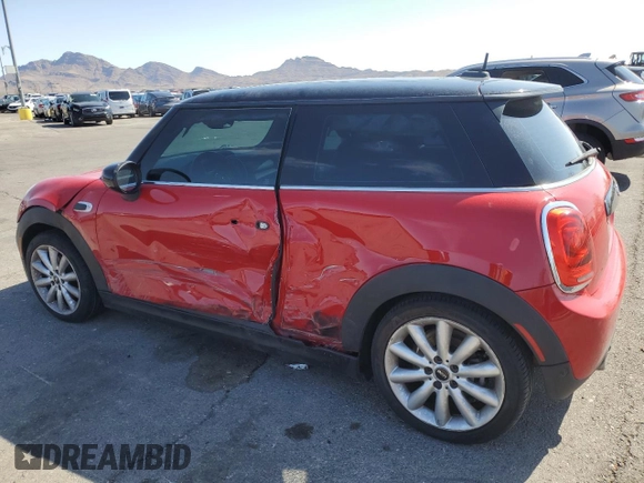 2021 MINI Hardtop Oxford Edition with VIN WMWXR3C09M2N13515, listed as a Copart auction lot 58490325 with 77,064 mi miles and Salvage title. Bid and sale history available at DreamBid. Image 2.