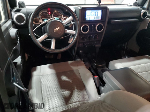 2008 Jeep Wrangler Unlimited Sahara with VIN 1J4GA59148L652001, listed as a Copart auction lot 48599655 with 161,436 mi miles and Clean title. Bid and sale history available at DreamBid. Image 8.