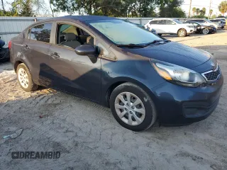 2014 Kia Rio EX with VIN KNADN4A39E6325590, listed as a Copart auction lot 71774344 with 90,785 mi miles and Salvage Title. Bid and sale history available at carsss.com. Image 4.