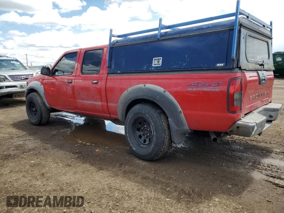 2002 Nissan Frontier XE with VIN 1N6ED29Y12C388949, listed as a Copart auction lot 55235875 with 212,944 mi miles and Salvage title. Bid and sale history available at DreamBid. Image 2.