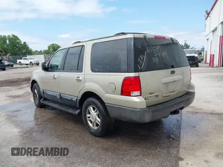 2004 Ford Expedition Special Service with VIN 1FMPU16L24LA37285, listed as a IAAI auction lot 41865431 with 244,616 mi miles. Bid and sale history available at carsss.com. Image 3.
