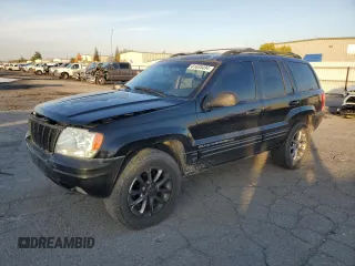 2001 Jeep Grand Cherokee Limited with VIN 1J4GX58S01C652737, listed as a Copart auction lot 81635494 with 175,498 mi miles and Salvage Title. Bid and sale history available at DreamBid. Image 1.