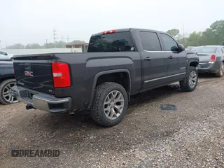2014 GMC Sierra 1500 SLT with VIN 3GTP1VEC0EG347231, listed as a IAAI auction lot 41909030 with 144,769 mi miles and . Bid and sale history available at DreamBid. Image 4.