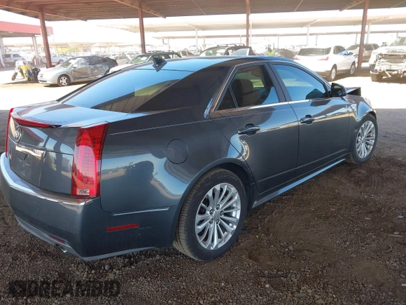 2010 Cadillac CTS with VIN 1G6DK5EG0A0141007, listed as a IAAI auction lot 41841972 with 142,898 mi miles and . Bid and sale history available at DreamBid. Image 4.