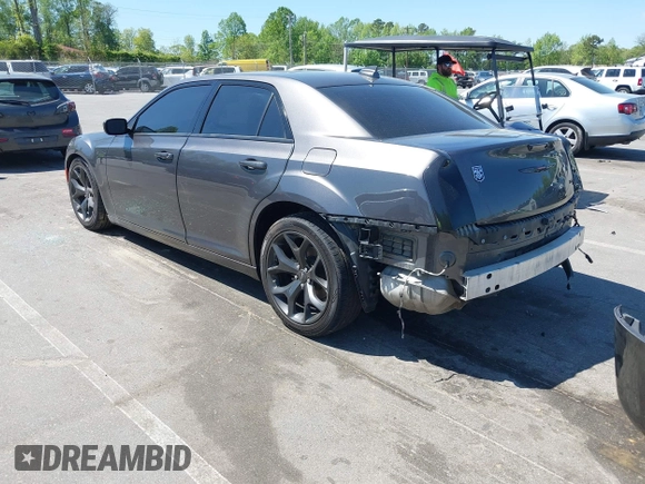 2022 Chrysler 300 S with VIN 2C3CCABG1NH259933, listed as a IAAI auction lot 42056429 with 51,327 mi miles and . Bid and sale history available at DreamBid. Image 3.