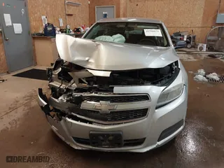2013 Chevrolet Malibu LS with VIN 1G11B5SA6DF256933, listed as a IAAI auction lot 41598872 with 142,931 mi miles. Bid and sale history available at carsss.com. Image 12.