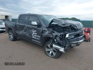 2022 Ram 1500 Laramie with VIN 1C6SRFJTXNN270154, listed as a IAAI auction lot 39546496 with Not provided miles and . Bid and sale history available at DreamBid. Image 1.