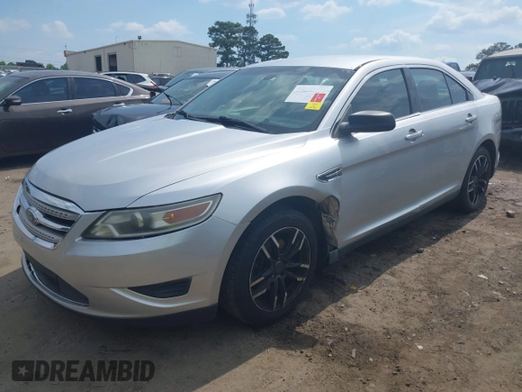 2011 Ford Taurus SE with VIN 1FAHP2DW9BG179423, listed as a IAAI auction lot 39683731 with 297,445 mi miles. Bid and sale history available at carsss.com. Image 19.