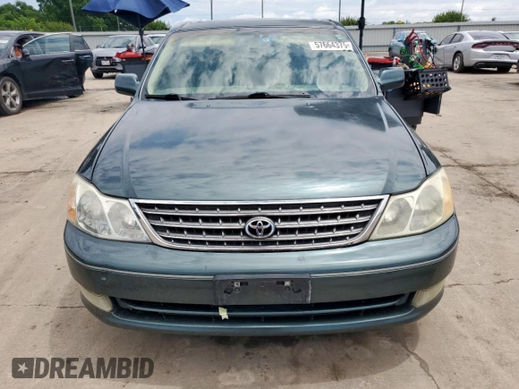 2003 Toyota Avalon XL z VIN 4T1BF28BX3U310285, wystawiony jako Copart lot #57664375 z przebiegiem 179 727 mil mil oraz Szkoda całkowita • Salvage title. Historia ofert i sprzedaży dostępna na DreamBid. Obrazek 5.