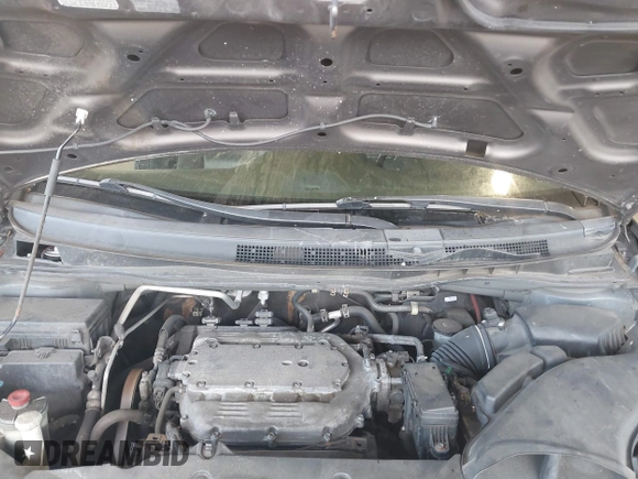2012 Honda Odyssey EX-L with VIN 5FNRL5H67CB016934, listed as a IAAI auction lot 42405714 with 248,512 mi miles and . Bid and sale history available at DreamBid. Image 10.