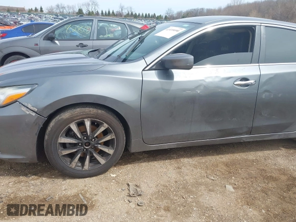 2018 Nissan Altima SR with VIN 1N4AL3AP1JC115513, listed as a IAAI auction lot 41939090 with 118,215 mi miles and . Bid and sale history available at DreamBid. Image 6.