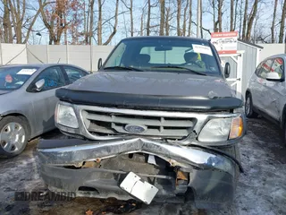 2003 Ford F-150 XL with VIN 2FTRX18W73CB07559, listed as a IAAI auction lot 41452402 with 152,509 mi miles. Bid and sale history available at carsss.com. Image 6.