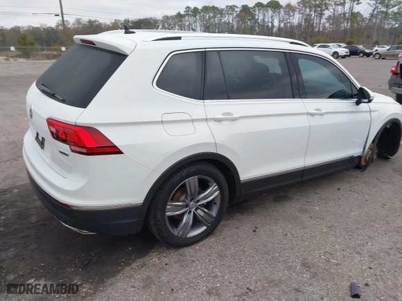 2019 Volkswagen Tiguan SEL Premium with VIN 3VV4B7AXXKM004316, listed as a IAAI auction lot 41458459 with 36,709 mi miles. Bid and sale history available at carsss.com. Image 4.