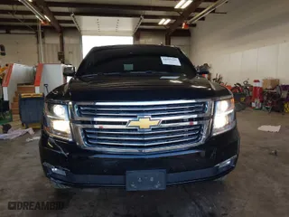 2015 Chevrolet Suburban LTZ with VIN 1GNSKKKC2FR115572, listed as a IAAI auction lot 41959541 with 120,123 mi miles. Bid and sale history available at carsss.com. Image 12.