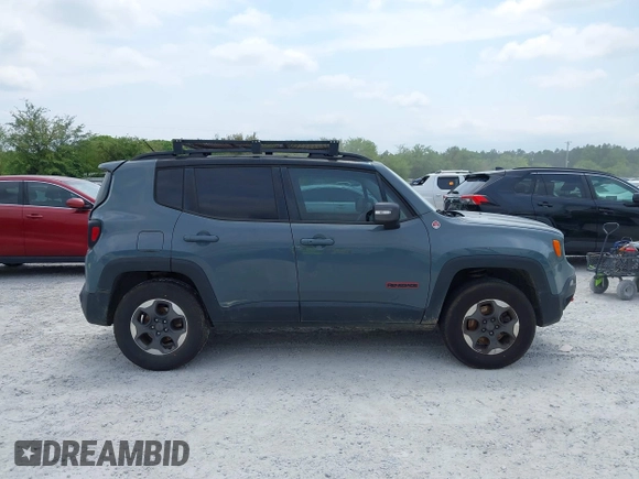 2017 Jeep Renegade Deserthawk z VIN ZACCJBCBXHPF82004, wystawiony jako IAAI lot #42027598 z przebiegiem Nie podano mil oraz . Historia ofert i sprzedaży dostępna na DreamBid. Obrazek 13.