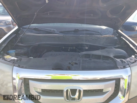 2011 Honda Pilot Touring with VIN 5FNYF4H92BB090056, listed as a IAAI auction lot 42010682 with 201,640 mi miles. Bid and sale history available at carsss.com. Image 10.