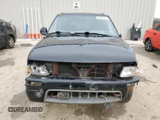 1998 Oldsmobile Bravada z VIN 1GHDT13W9W2730673, wystawiony jako Copart lot #80996524 z przebiegiem 126 418 mil mil oraz Nie do naprawy. Historia ofert i sprzedaży dostępna na DreamBid. Obrazek 5.
