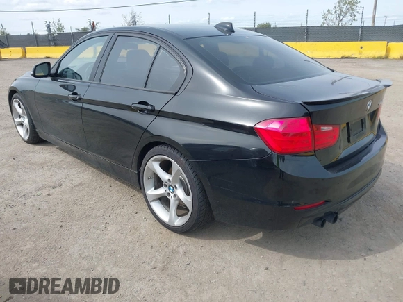 2012 BMW 3 Series 328i with VIN WBA3A5C56CF345904, listed as a IAAI auction lot 41992572 with 136,672 mi miles. Bid and sale history available at carsss.com. Image 3.