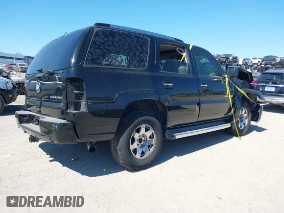 2005 Cadillac Escalade z VIN 1GYEK63N75R134012, wystawiony jako IAAI lot #41821485 z przebiegiem 165 655 mil mil oraz . Historia ofert i sprzedaży dostępna na DreamBid. Obrazek 4.