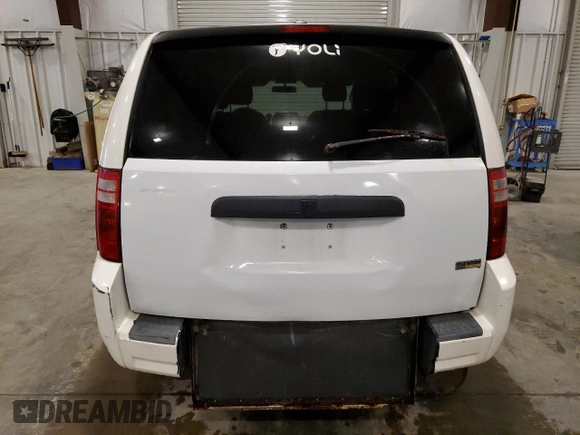 2009 Dodge Grand Caravan SE z VIN 2D8HN44E99R542025, wystawiony jako Copart lot #61003595 z przebiegiem 222 476 mil mil oraz Szkoda całkowita • Salvage title. Historia ofert i sprzedaży dostępna na DreamBid. Obrazek 6.