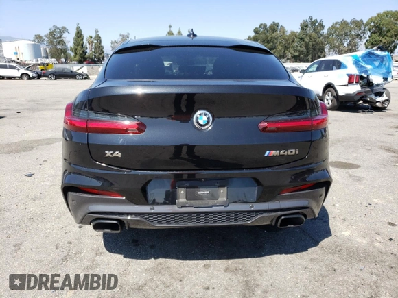 2021 BMW X4 M40i with VIN 5UX2V5C01M9F81840, listed as a Copart auction lot 56868653 with 0 mi miles. Bid and sale history available at carsss.com. Image 6.
