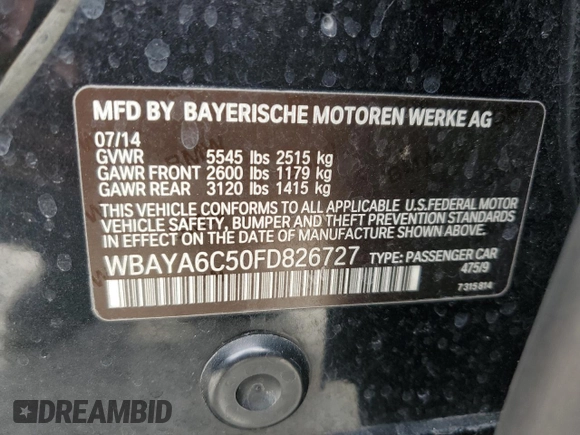 2015 BMW 7 Series 740i with VIN WBAYA6C50FD826727, listed as a Copart auction lot 82197433 with 241,799 mi miles and . Bid and sale history available at DreamBid. Image 12.