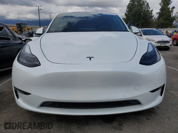 2022 Tesla Model Y Long Range with VIN 7SAYGDEE3NF558379, listed as a Copart auction lot 48594035 with 12,501 mi miles and Salvage Title. Bid and sale history available at carsss.com. Image 5.