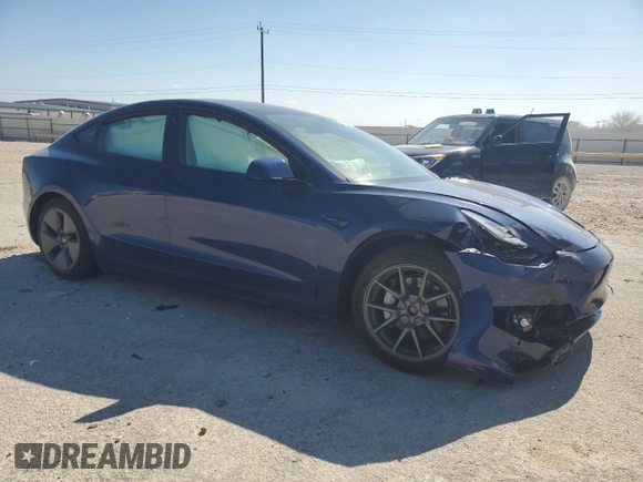 2022 Tesla Model 3 Long Range with VIN 5YJ3E1EB6NF249443, listed as a Copart auction lot 42940215 with Not Provided miles and Salvage Title. Bid and sale history available at DreamBid. Image 4.