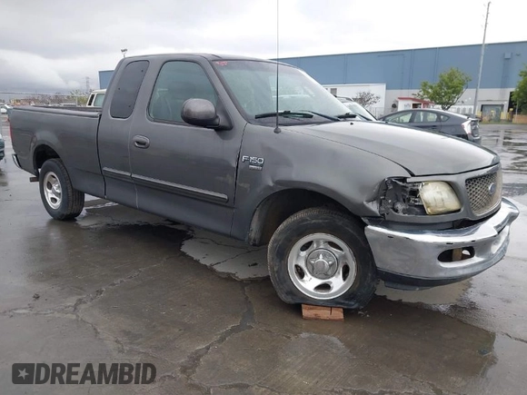 2003 Ford F-150 XL with VIN 1FTRX17W03NB51687, listed as a IAAI auction lot 41712022 with 183,428 mi miles. Bid and sale history available at carsss.com. Image 1.