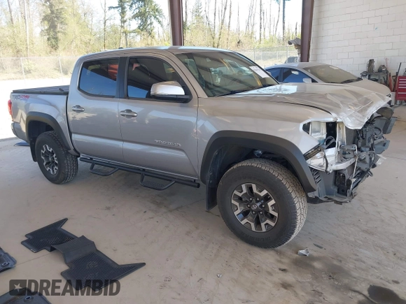 2018 Toyota Tacoma SR with VIN 3TMCZ5ANXJM146284, listed as a IAAI auction lot 42041525 with 103,143 mi miles and . Bid and sale history available at DreamBid. Image 1.