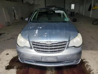 2007 Chrysler Sebring z VIN 1C3LC46K97N504536, wystawiony jako Copart lot #55334425 z przebiegiem 238 920 mil mil oraz Szkoda całkowita • Salvage title. Historia ofert i sprzedaży dostępna na DreamBid. Obrazek 5.