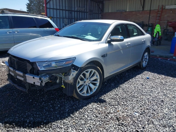 2015 Ford Taurus Limited with VIN 1FAHP2F81FG130088, listed as a IAAI auction lot 41738245 with 87,964 mi miles. Bid and sale history available at carsss.com. Image 2.