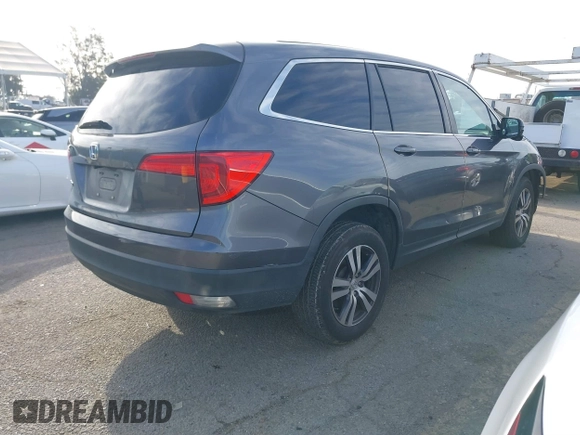 2016 Honda Pilot EX with VIN 5FNYF5H33GB015231, listed as a IAAI auction lot 41809357 with 145,970 mi miles. Bid and sale history available at carsss.com. Image 4.