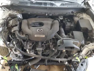 2017 Mazda CX-9 Touring z VIN JM3TCACY8H0138948, wystawiony jako Copart lot #86755594 z przebiegiem 89 828 mil mil oraz Szkoda całkowita • Salvage title. Historia ofert i sprzedaży dostępna na DreamBid. Obrazek 12.