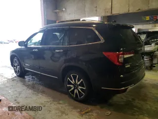 2020 Honda Pilot Touring 8-Passenger with VIN 5FNYF6H90LB043055, listed as a Copart auction lot 85194544 with 82,144 mi miles and Salvage Title. Bid and sale history available at DreamBid. Image 2.