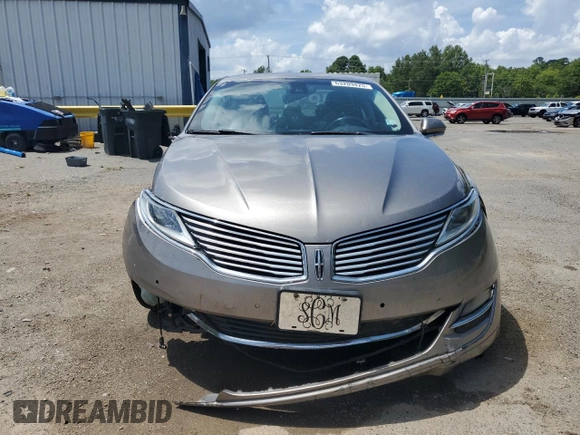 2016 Lincoln MKZ z VIN 3LN6L2J96GR601039, wystawiony jako Copart lot #63209425 z przebiegiem 151 629 mil mil oraz Szkoda całkowita • Salvage title. Historia ofert i sprzedaży dostępna na DreamBid. Obrazek 5.