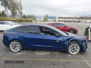 2023 Tesla Model 3 with VIN 5YJ3E1EA0PF518983, listed as a IAAI auction lot 41749225 with 26,748 mi miles and . Bid and sale history available at DreamBid. Image 14.