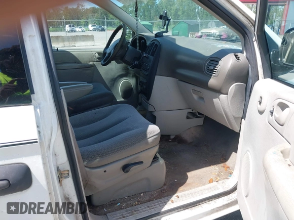 2005 Dodge Caravan SE with VIN 1D4GP25B45B103520, listed as a IAAI auction lot 42612643 with 168,847 mi miles and . Bid and sale history available at DreamBid. Image 5.
