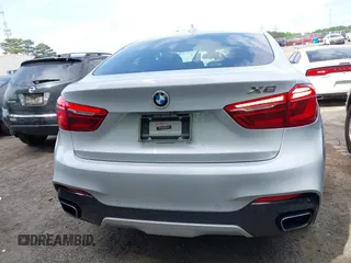 2016 BMW X6 xDrive50i z VIN 5UXKU6C57G0R33572, wystawiony jako IAAI lot #42103956 z przebiegiem 65 520 mil mil oraz . Historia ofert i sprzedaży dostępna na DreamBid. Obrazek 15.