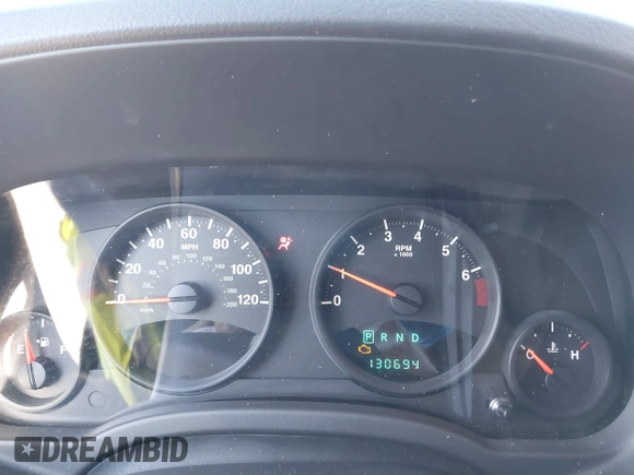 2011 Jeep Compass with VIN 1J4NF1FB6BD180447, listed as a IAAI auction lot 41575014 with 130,694 mi miles. Bid and sale history available at carsss.com. Image 7.