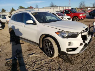 2018 BMW X1 xDrive28i with VIN WBXHT3C38J5L31384, listed as a Copart auction lot 66323172 with 74,272 mi miles. Bid and sale history available at carsss.com. Image 1.