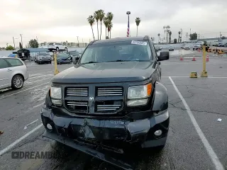 2011 Dodge Nitro Heat with VIN 1D4PT4GX9BW504789, listed as a Copart auction lot 43700585 with 57,944 mi miles and Salvage Title. Bid and sale history available at DreamBid. Image 12.